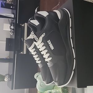 (New) Versace size 11 Black Vitello Gommato